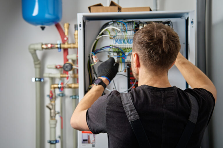 electrician repairing heat pump control panel 2026 03 24 05 28 04 utc scaled.jpg