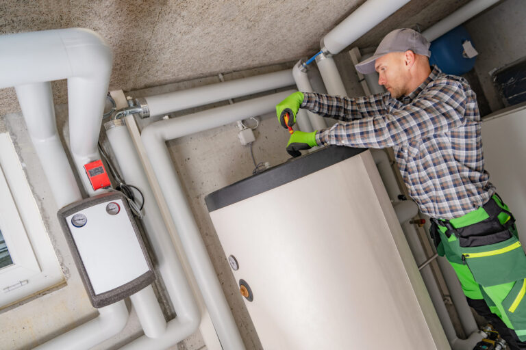 professional plumber repairing residential boiler 2026 03 23 23 00 33 utc scaled.jpg
