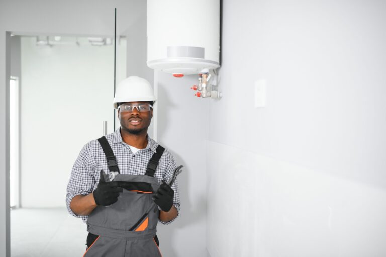 young african male plumber repairing boiler 2026 03 24 05 15 19 utc scaled.jpg